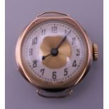 A vintage 9 ct rose gold two tone dial ladies wristwatch, in working order.