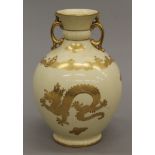 A Coalport vase decorated with dragons. 21.5 cm high.