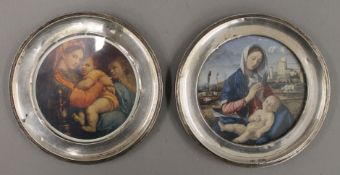 Two silver circular photograph frames. 13 cm diameter.