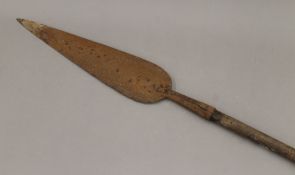 An African tribal spear. 188 cm long.
