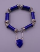 A 925 silver mounted lapis bracelet with padlock clasp. 20.5 cm long.