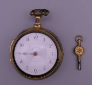 A Verge pair cased pocket watch. 5 cm diameter.