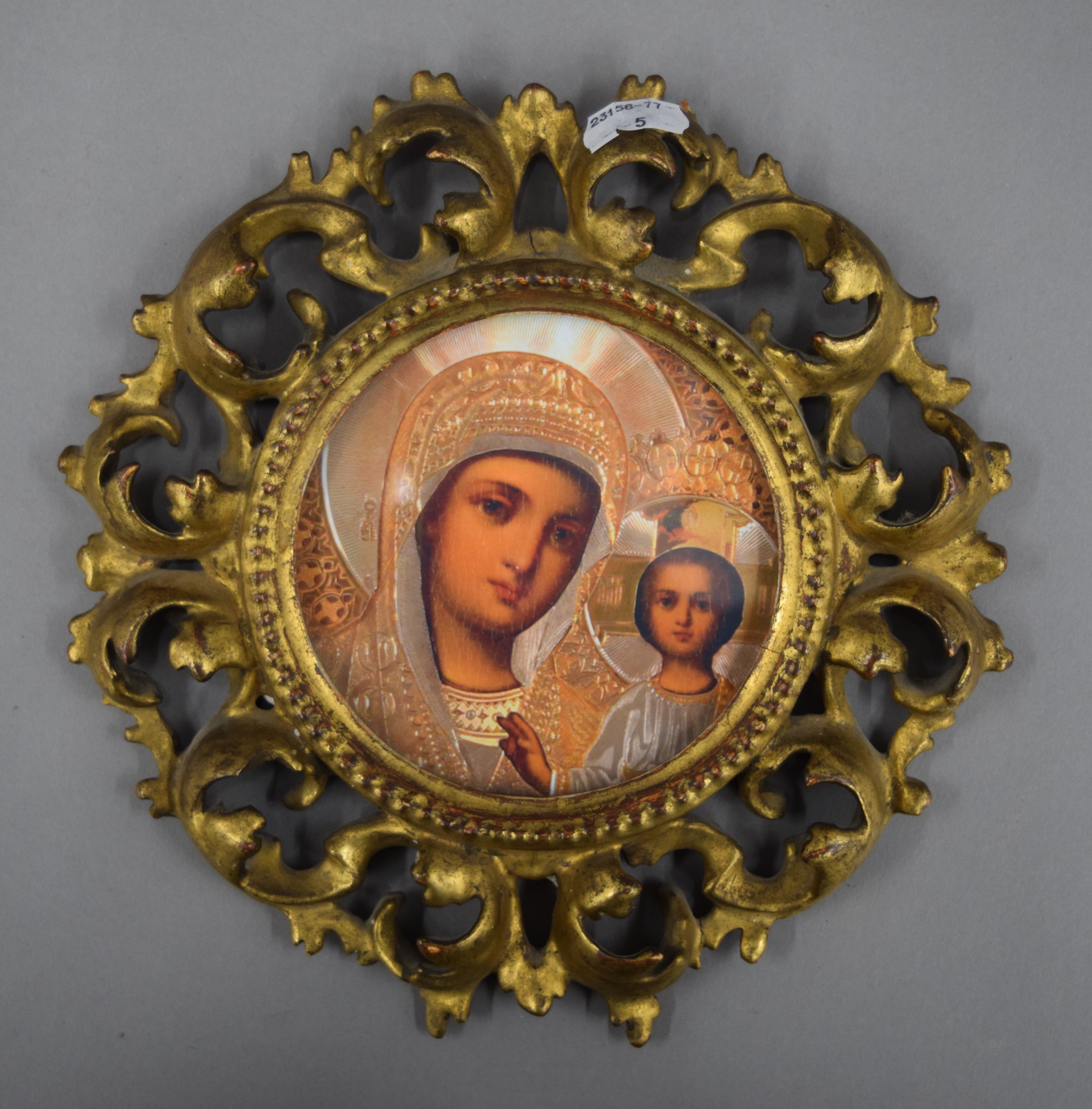 An 18th/19th century carved gilt wood Florentine circular frame. 22.5 cm diameter.