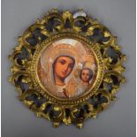 An 18th/19th century carved gilt wood Florentine circular frame. 22.5 cm diameter.