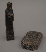 A Chinese carved soapstone figure and a scroll weight. The former 14.5 cm high.