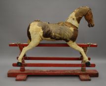 A vintage rocking horse. 107 cm long overall.