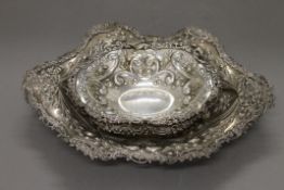 Five embossed silver dishes. The largest 36 cm wide. 48.7 troy ounces.