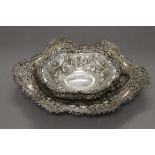 Five embossed silver dishes. The largest 36 cm wide. 48.7 troy ounces.