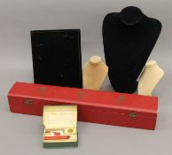 A box with the cypher of George VI, necklace stands, seal box, etc.