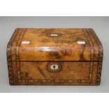 A Victorian inlaid walnut sewing box. 30 cm wide.