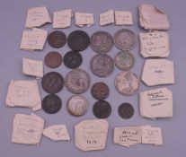 A coin collection, including various early and silver coins, and tokens.