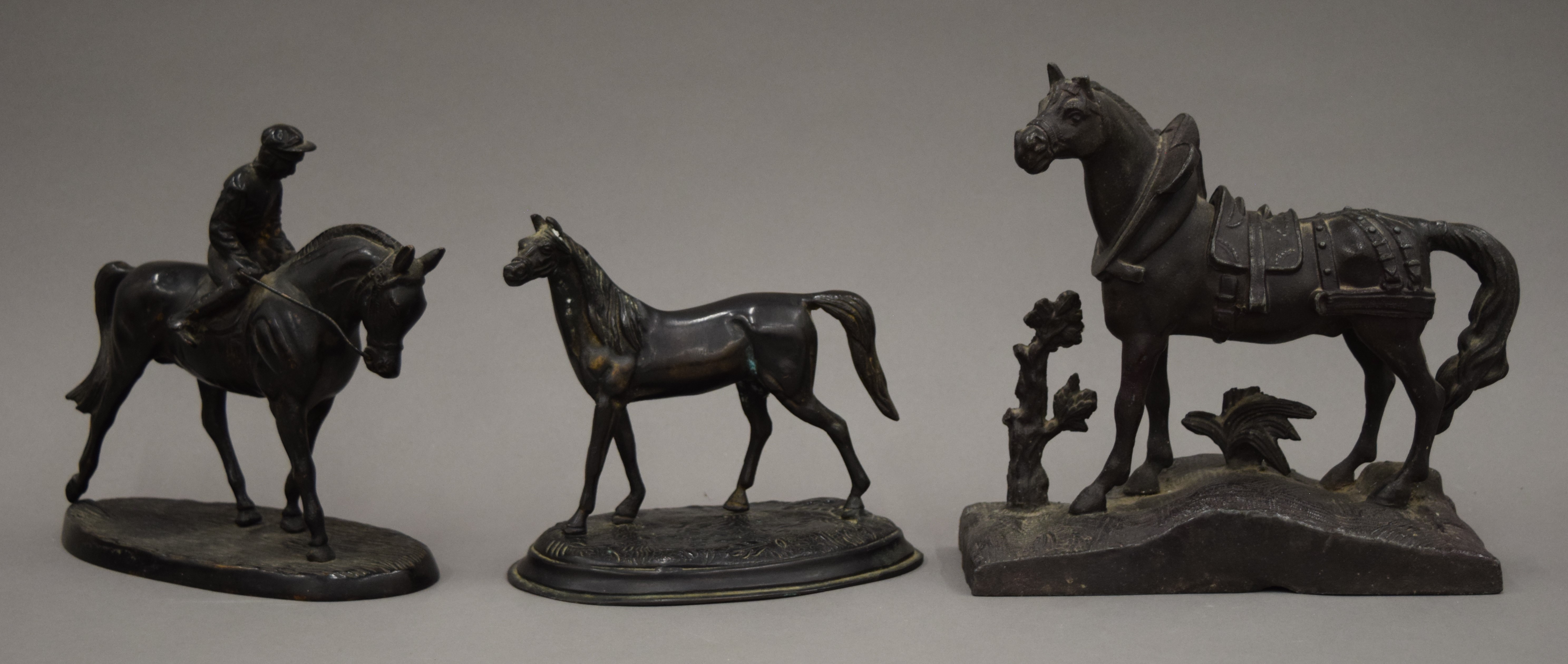 Three horse sculptures. The largest 17 cm high.