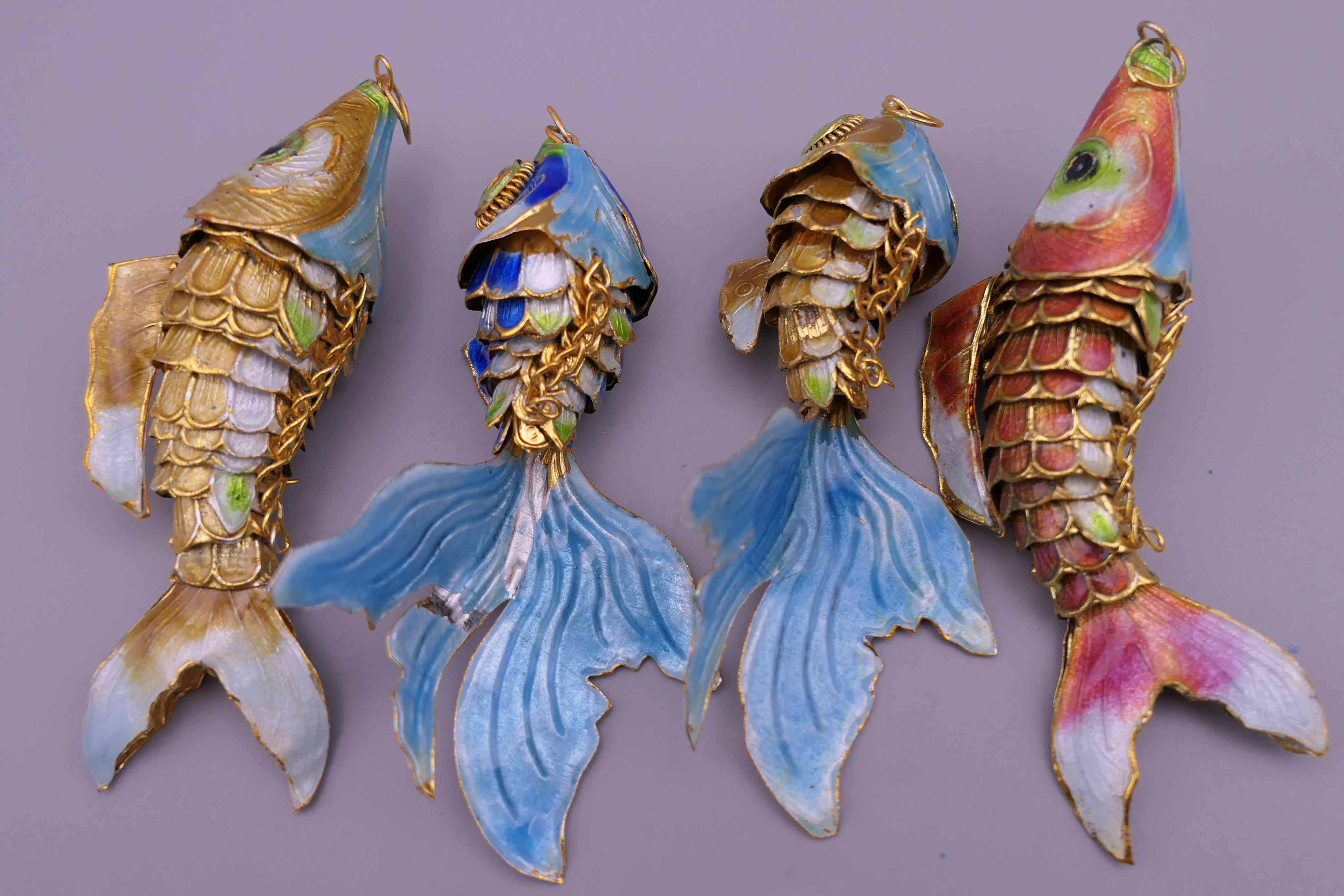 Four enamel decorated fish. The largest 9.5 cm long. - Image 4 of 4