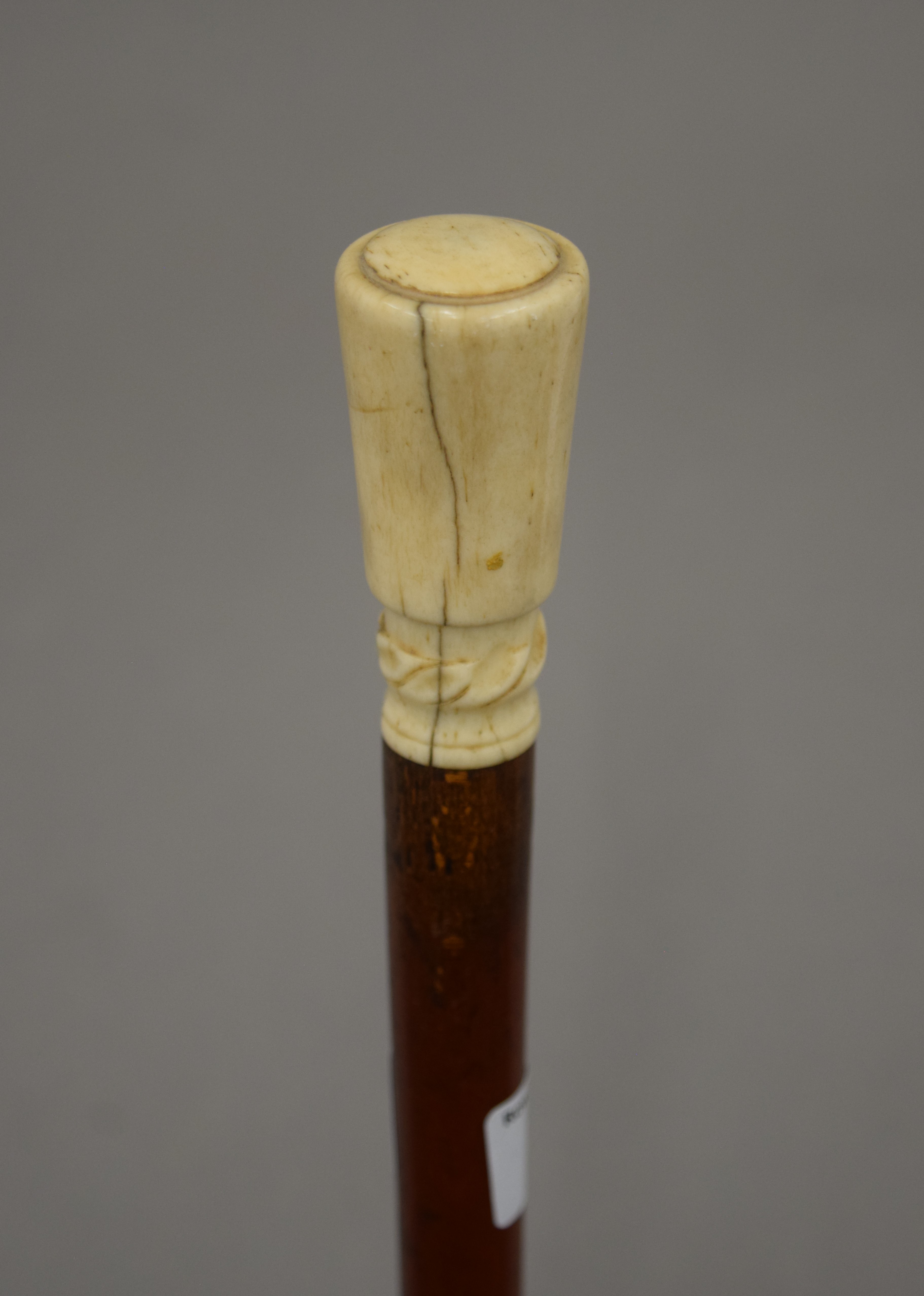A Victorian ivory handled walking stick with detachable handle and ferrule, and hollow shaft. 88. - Image 2 of 3