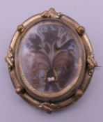 A Victorian mourning brooch. 4.5 cm high.