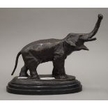 A bronze model of an elephant. 20 cm high.