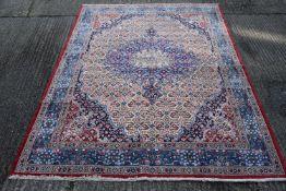A Moud carpet. 315 x 218 cm.