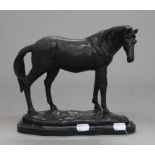 A bronze model of a horse. 24 cm long.