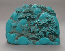 A model of a Chinese boulder carving. 16 cm long.