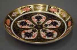 A Royal Crown Derby saucer. 14 cm diameter.