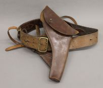 A leather gun holster and belt, possibly First World War.