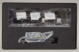 A Spectrum by Bachmann boxed HO Scale locomotive and tender.