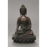 A bronze model of Buddha. 28.5 cm high.