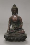 A bronze model of Buddha. 28.5 cm high.