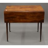 A George III mahogany Pembroke table. 82.5 cm long.