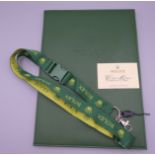 A Rolex document folder and a Rolex lanyard.