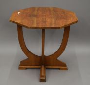 An Art Deco walnut coffee table. 60.5 cm wide.
