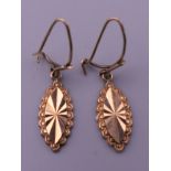 A pair of 9 ct gold drop earrings. 1.7 grammes total weight.