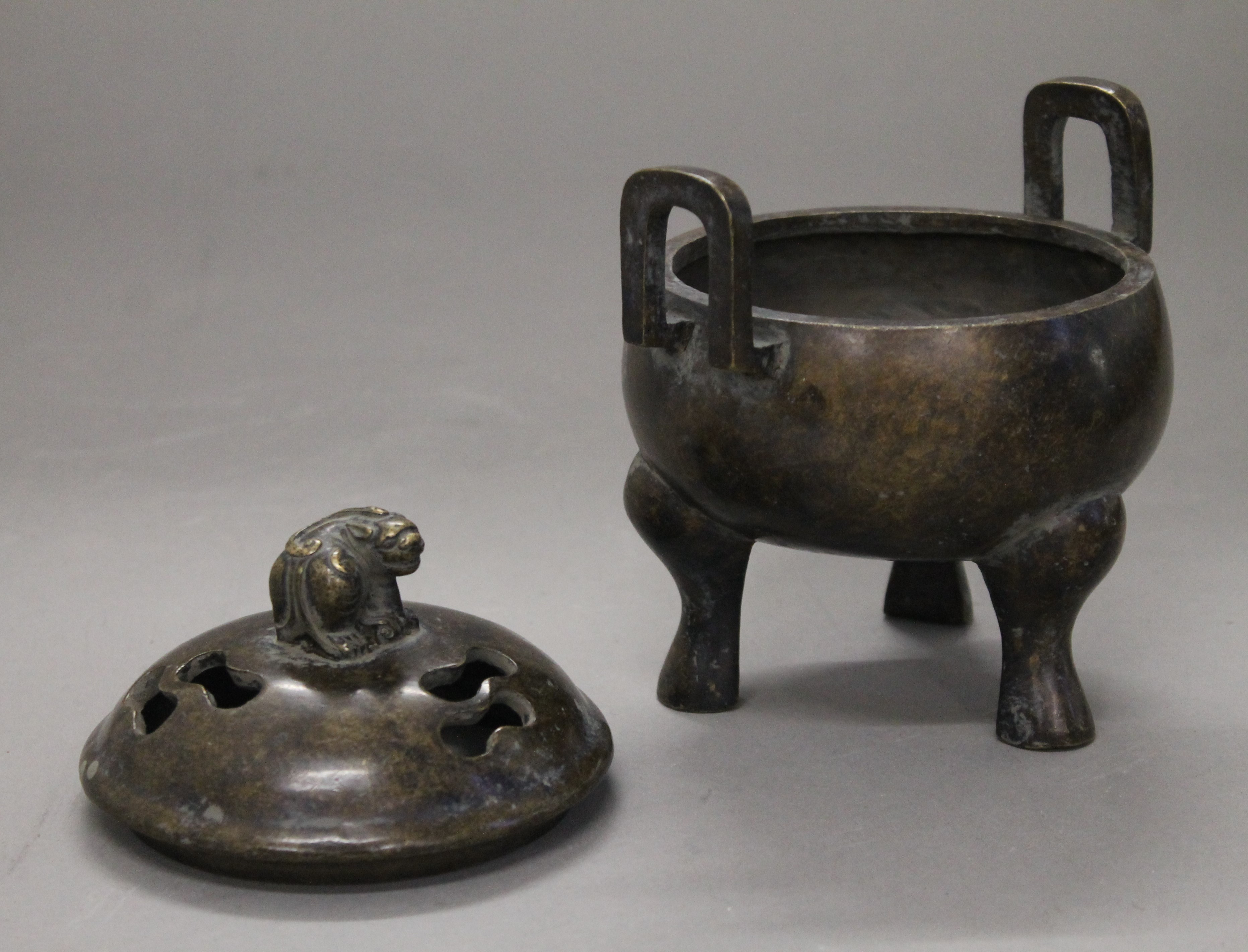 A Chinese bronze lidded censer. 14 cm wide. - Image 4 of 6