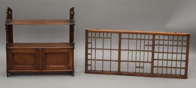 A Victorian walnut hanging shelf and a printer's tray. The former 53 cm wide.