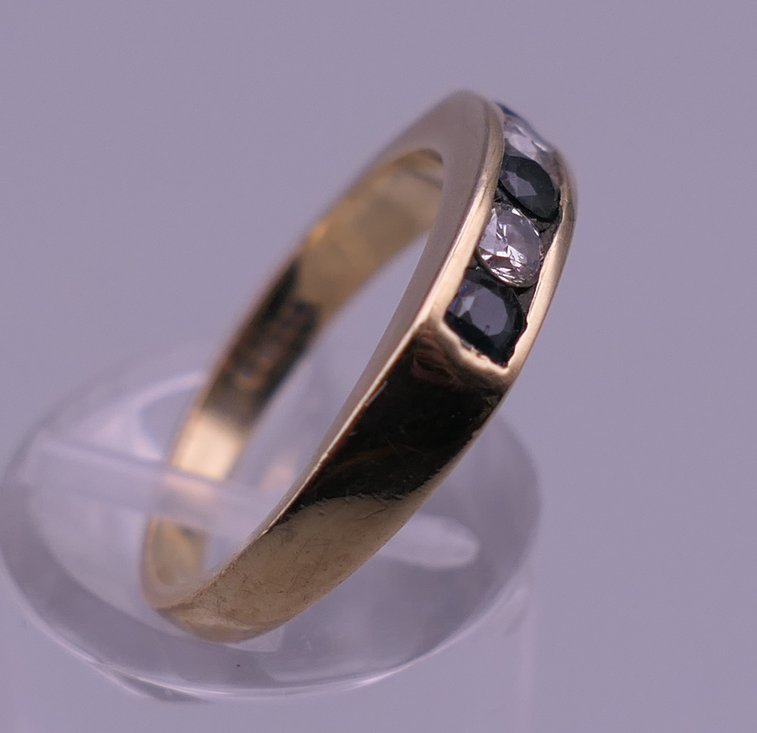 A 9 ct gold diamond and sapphire ring. Ring size N. 2.9 grammes total weight. - Image 2 of 7