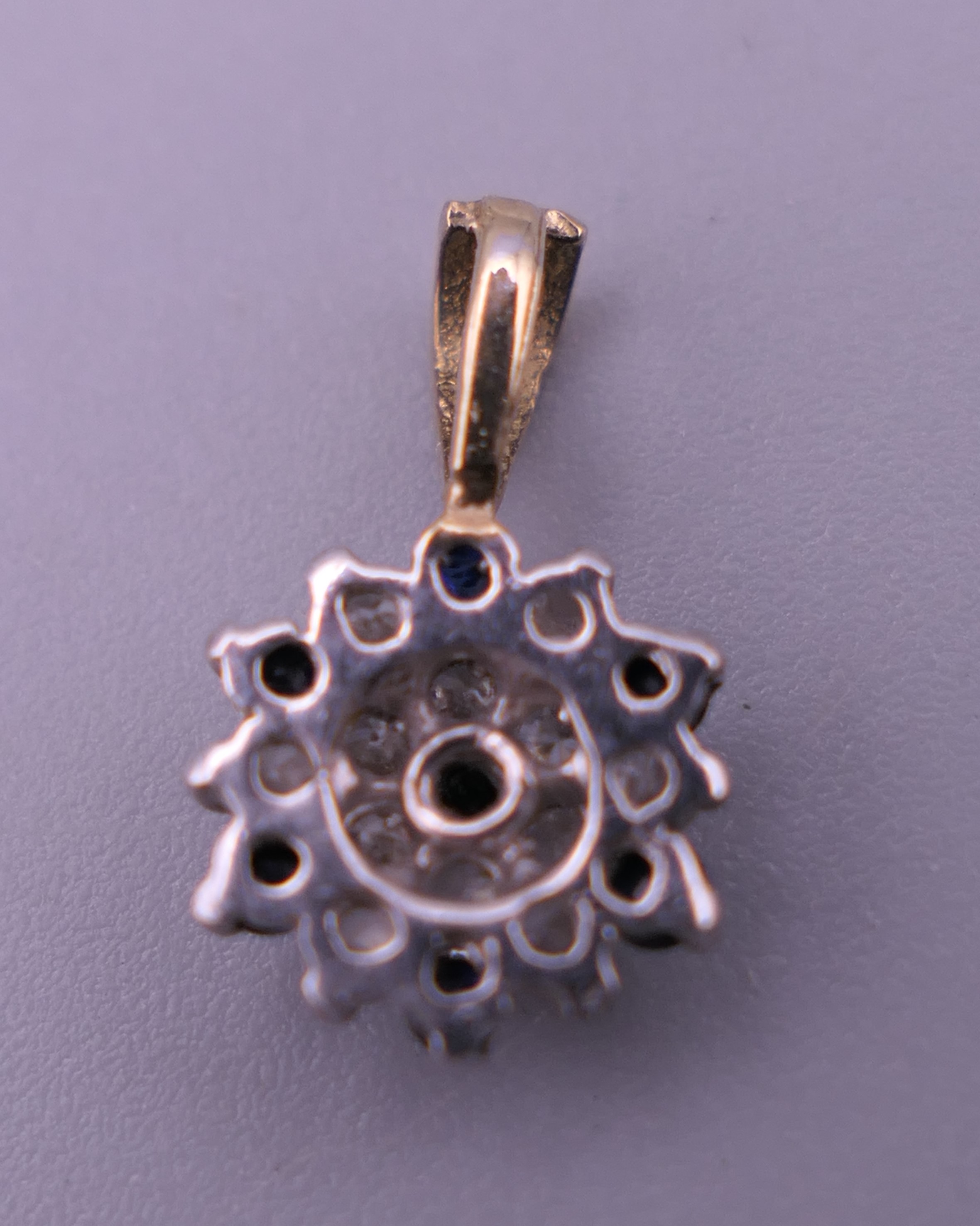 A pair of 9 ct gold and white gold sapphire earrings and matching pendant. 1.7 grammes total weight. - Image 3 of 5