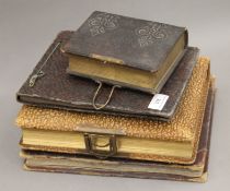 Four vintage photograph albums.