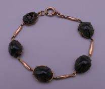 An antique natural scarab beetle bracelet. 17 cm long.