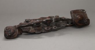 A wooden ruyi sceptre. 43 cm long.