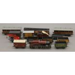 A large quantity of Hornby and Bassett Lowke O-Gauge train set and accessories,