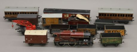 A large quantity of Hornby and Bassett Lowke O-Gauge train set and accessories,