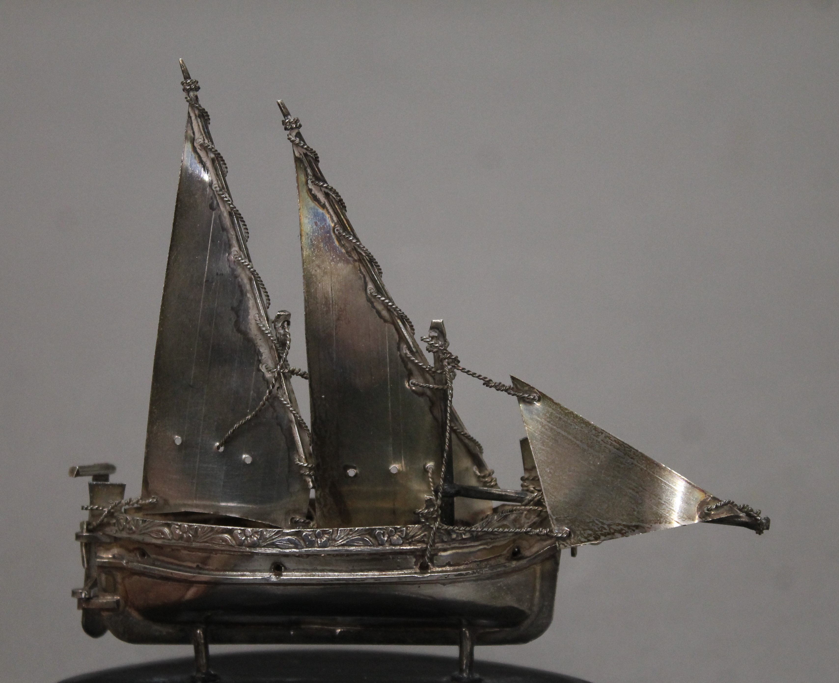 A Maltese silver model of a sailing boat on an oval wooden base. 10 cm high. - Image 2 of 3