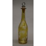 A 19th century etched glass yellow ground bottle. 30.5 cm high.