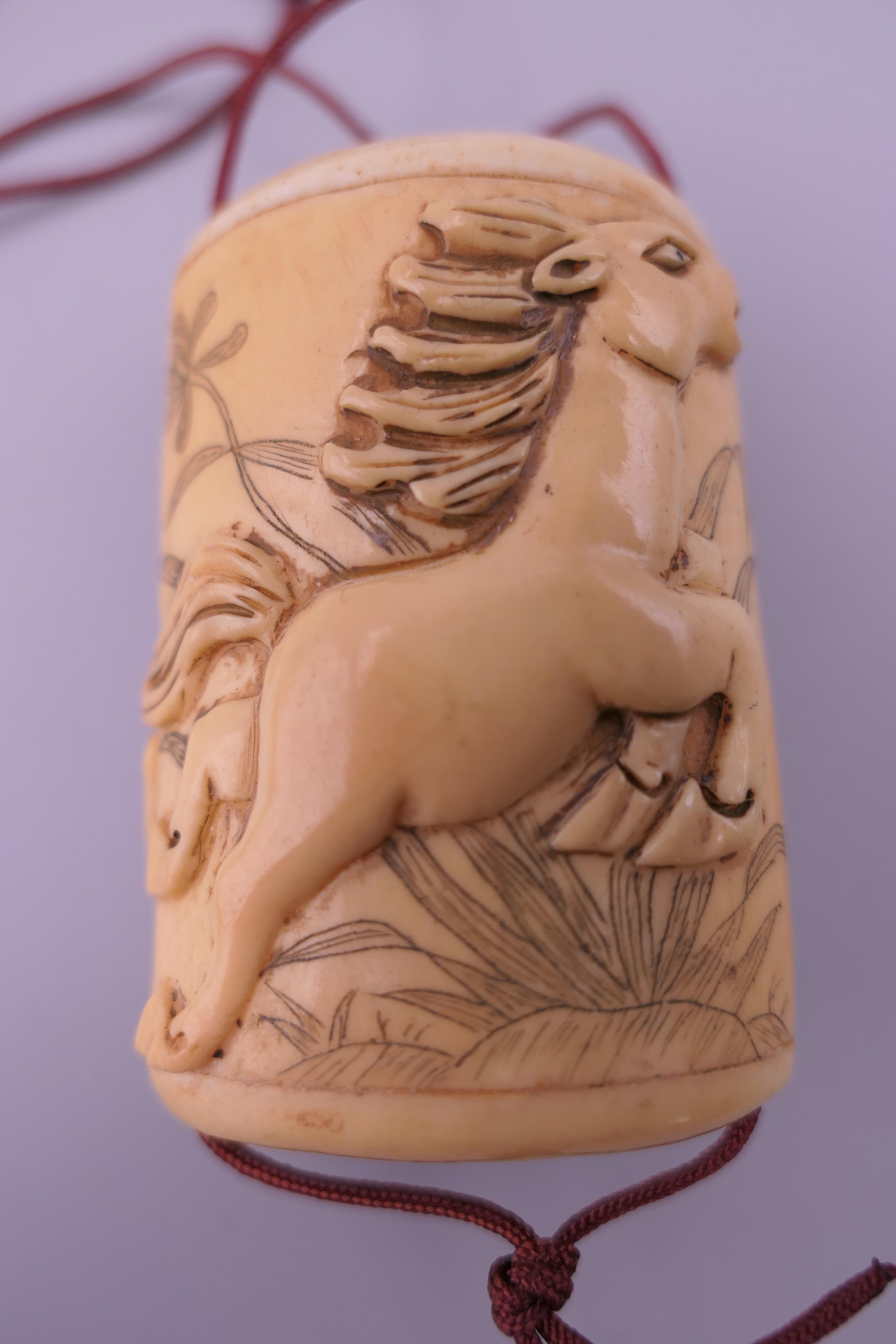 A carved bone inro decorated with horses. 5.5 cm high x 4 cm. - Image 3 of 6