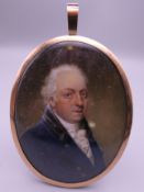 A late 18th/early 19th century unmarked gold framed portrait miniature on ivory of a gentleman,