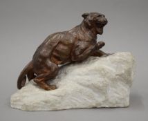 HENRI PAYEN (1894-1933) French, a patinated bronze model of a lion, signed,