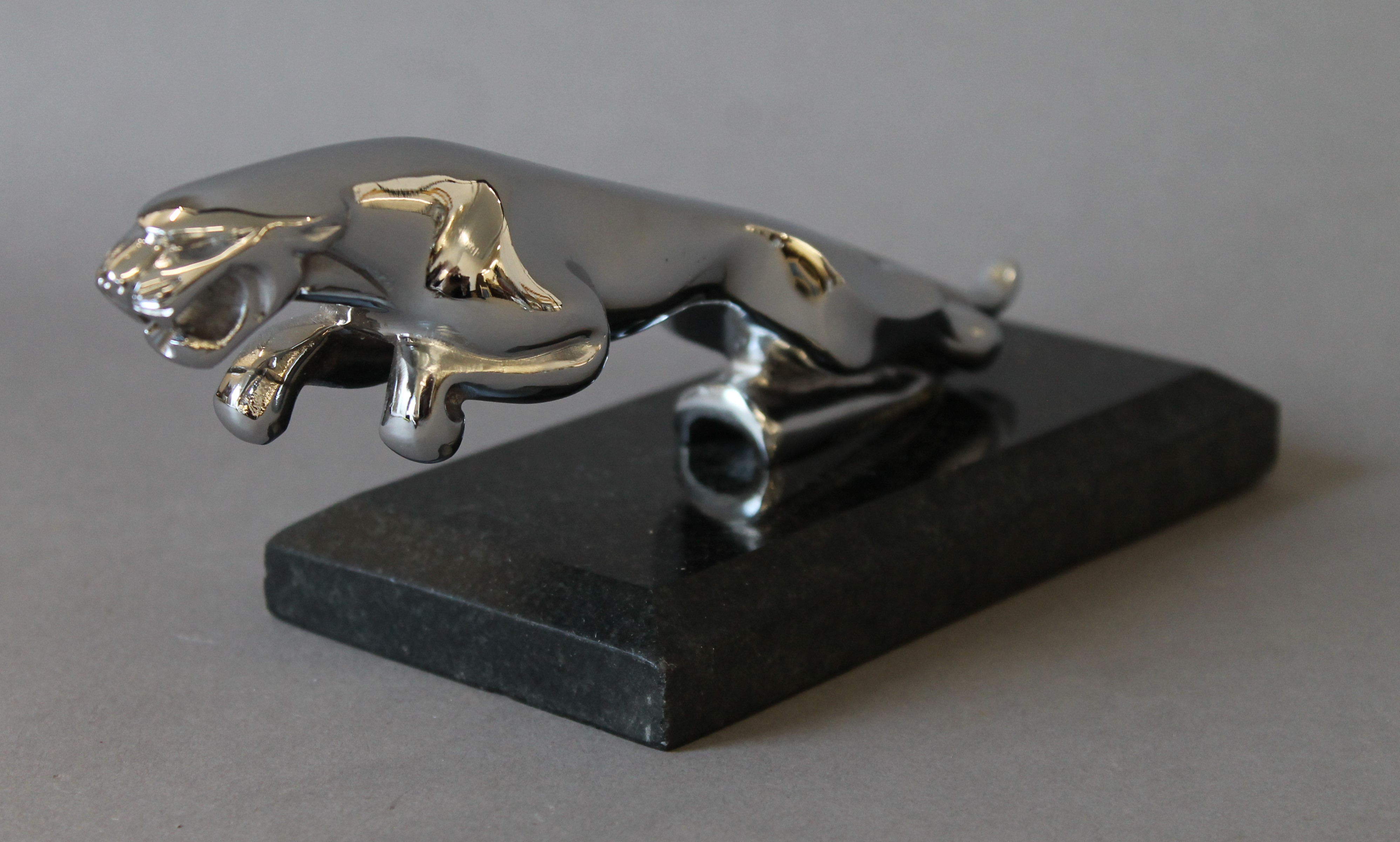 A chrome leaping Jaguar desk stand. 21 cm long. - Image 2 of 2