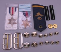 A collection of WWII medals including The France and Germany Star and The 1939-1945 Star, RAF items,
