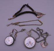 A ladies silver pocket watch, another pocket watch and three watch chains,