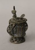 A small Eastern patinated bronze lidded urn. 8.5 cm high.